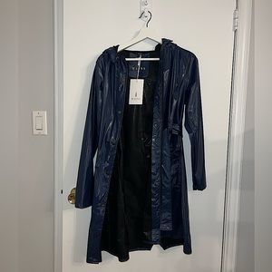 Rains raincoat never worn, new with tags